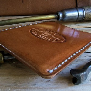 Hand stitched, edges hand polished