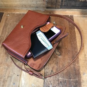 suissa gran clutch purse, adaptable to bicycle bag