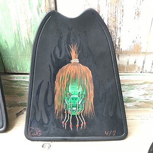 shrunken head splash guards