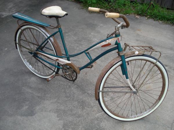 Late '50s, early '60s J.C.Higgens bike. 
Completely original (except tires), even the horn works. 
Got this for cleaning out another neighbor lady's
